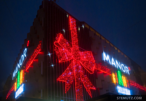 GIANT Christmas Lights 2015, Manor Fribourg with Saxophonist Marc Stucki