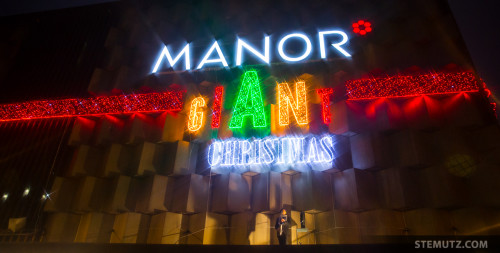GIANT Christmas Lights 2015, Manor Fribourg with Saxophonist Marc Stucki